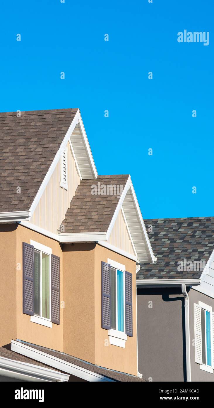 Vertical Row of upper floor house facades with shutters Stock Photo - Alamy