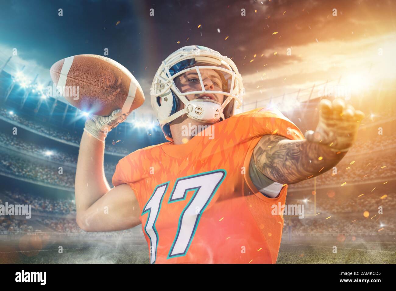 Adult football player throwing ball hires stock photography and images