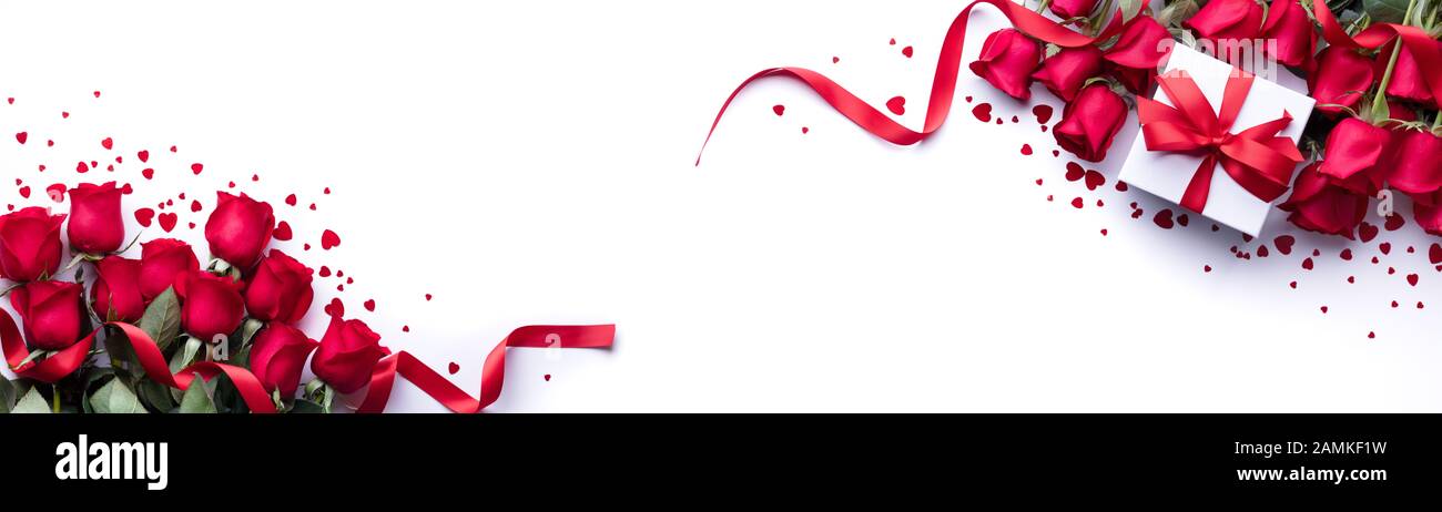 Valentines Day concept. Fresh red roses and gift box on white ...