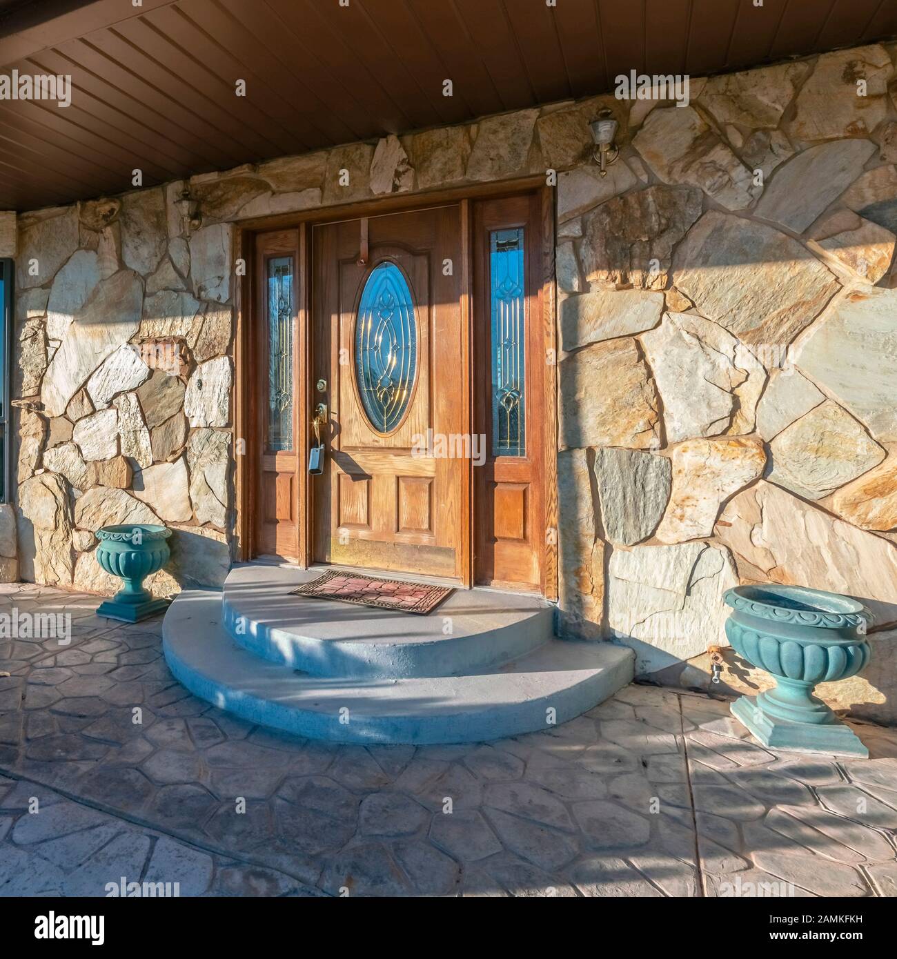 Square frame Modern house with paved patio and circular steps Stock ...