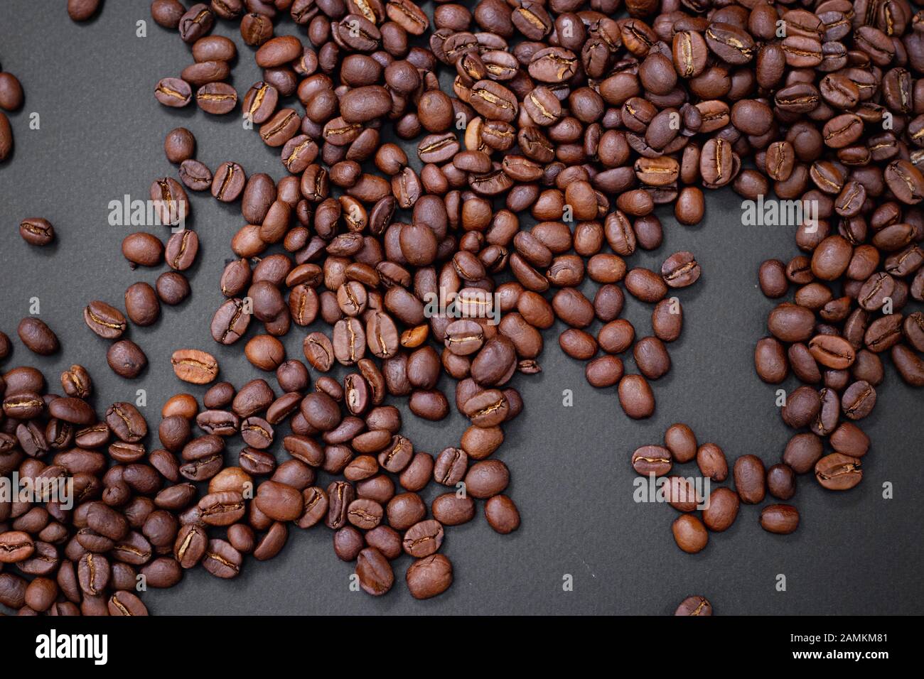 coffee beans on dark background Stock Photo - Alamy