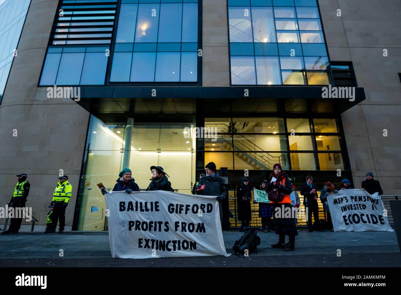 Leith Street, Edinburgh, Scotland, United Kingdom, 14 January 2020. Extinction Rebellion: part of the campaign’s week long action against companies in the fossil fuels industry. The activists target financial company Baillie Gifford from before dawn, who manage the MSP pension fund which includes shares in the oil company Shell. There is a large police presence to keep the situation in order Stock Photo