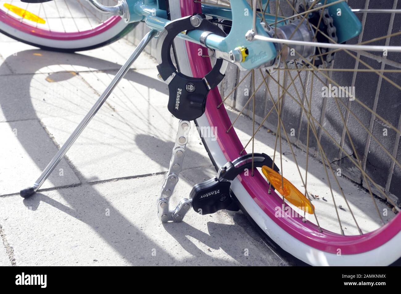 Bicycle lock in the form of handcuffs. [automated translation] Stock Photo