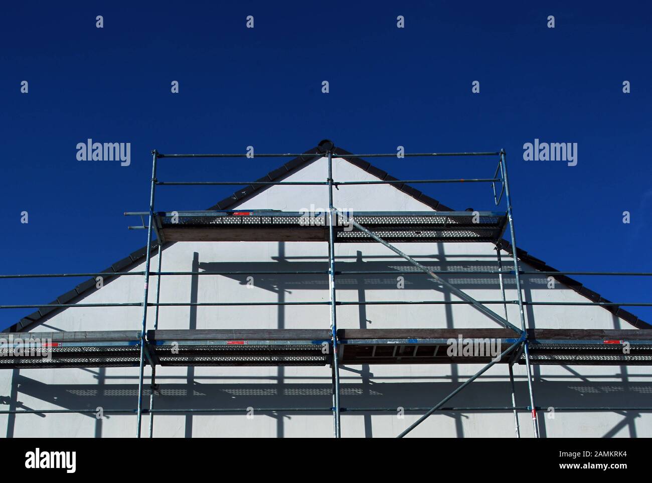 Scaffolding on the gable of a newly built detached house in Emmering. [automated translation] Stock Photo