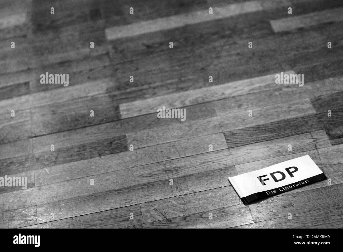 An FDP flag is lying on the floor at the New Year's reception of the FDP district association Fürstenfeldbruck in the city hall of Germering. [automated translation] Stock Photo
