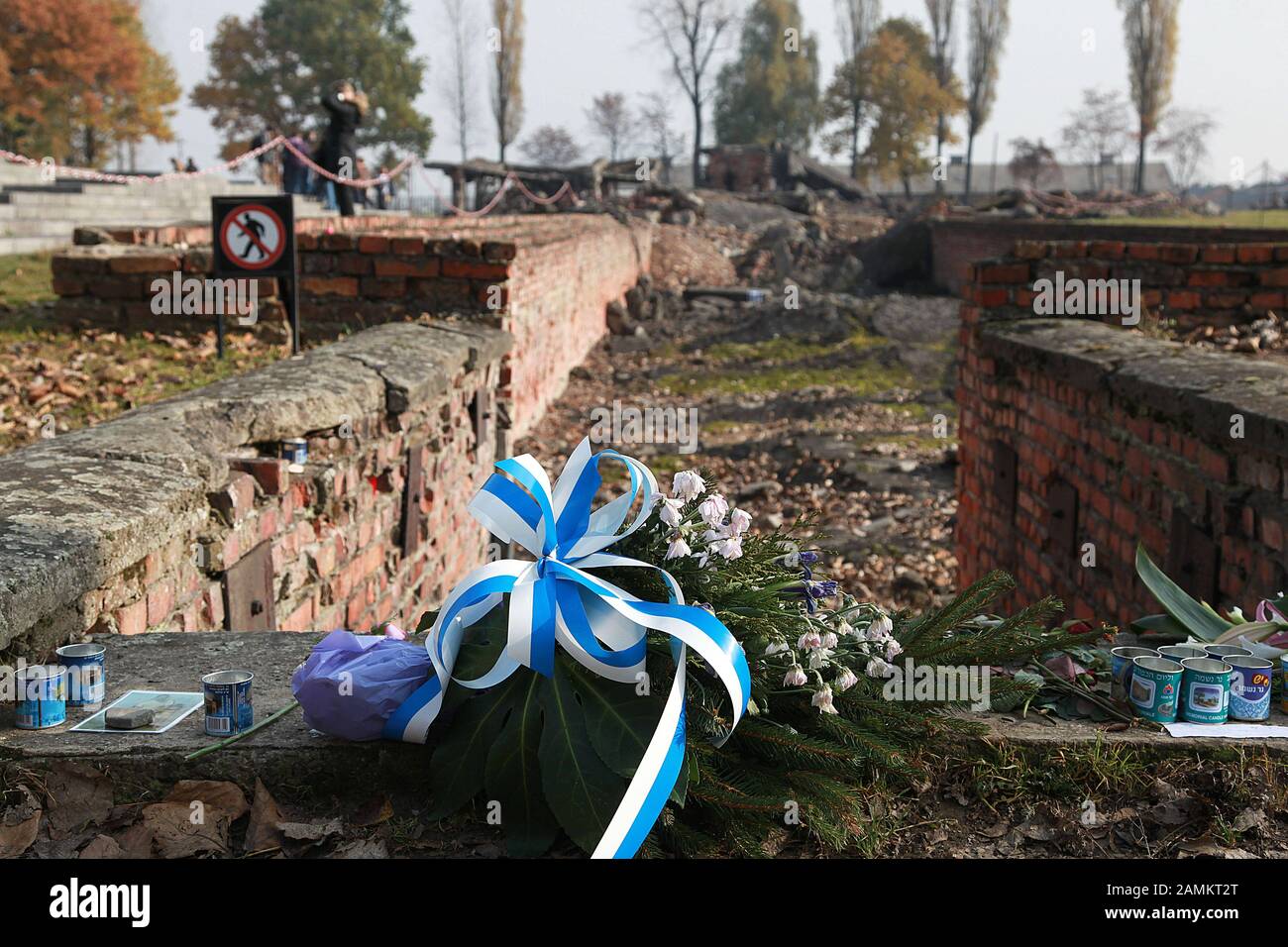 Remains of the gas chambers and crematoria with funeral devotional objects on the site of the memorial in the former concentration camp Auschwitz - Birkenau. [automated translation] Stock Photo