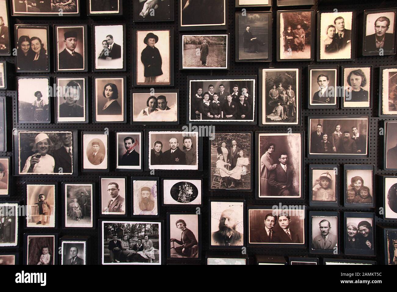Family photos from the luggage of the deportees in the former 'Canada' securities camp in the memorial site in the former Auschwitz - Birkenau concentration camp. [automated translation] Stock Photo