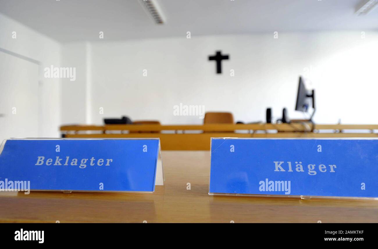 Plaque 'Plaintiff' and 'Defendant' in a hearing room at the Munich District Court on Nymphenburger Strasse. [automated translation] Stock Photo
