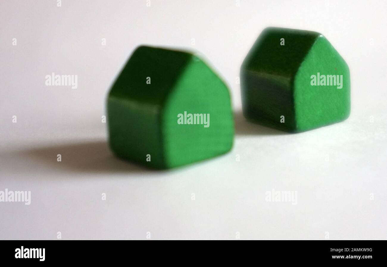 Green houses of a Monopoly game. [automated translation] Stock Photo