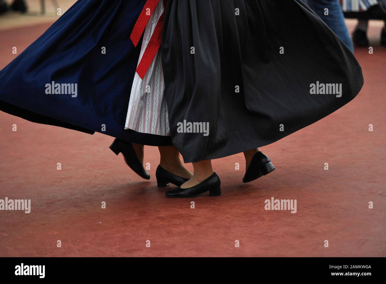 Two women in Dirndl dancing in the 'Herzkasperl-Festzelt' at the Oidn Wiesn. [automated translation] Stock Photo