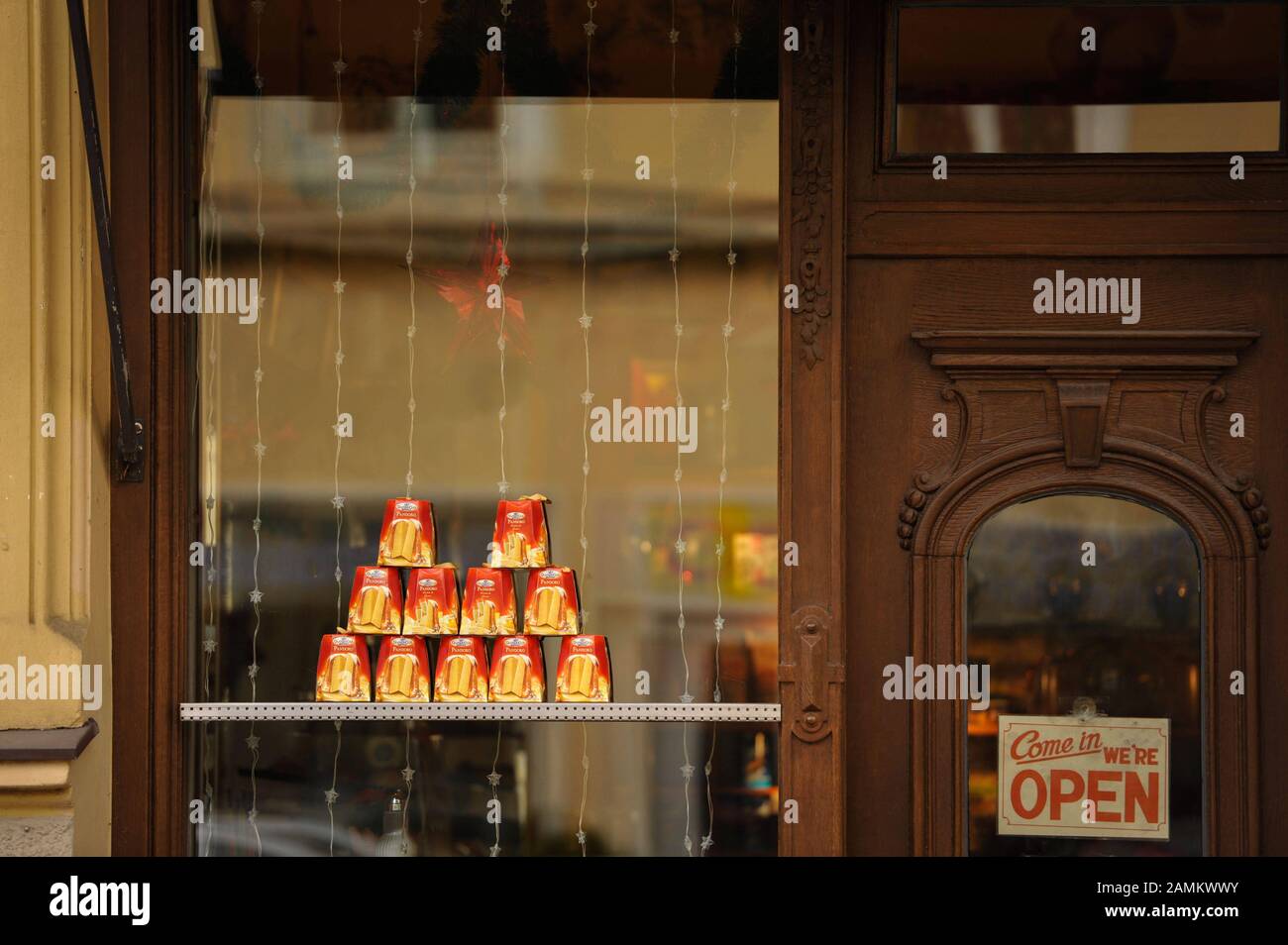 In the window of Mr. Baker's Coffee House in Steinstrasse there are piled up to