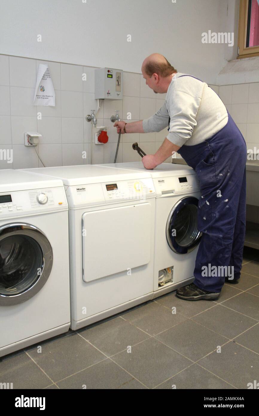 Washing machines and dryers for the residents in the newly renovated hostel for homeless men at Pistorinistraße 30 in Untergiesing, operated by the Catholic Men's Welfare Association. [automated translation] Stock Photo