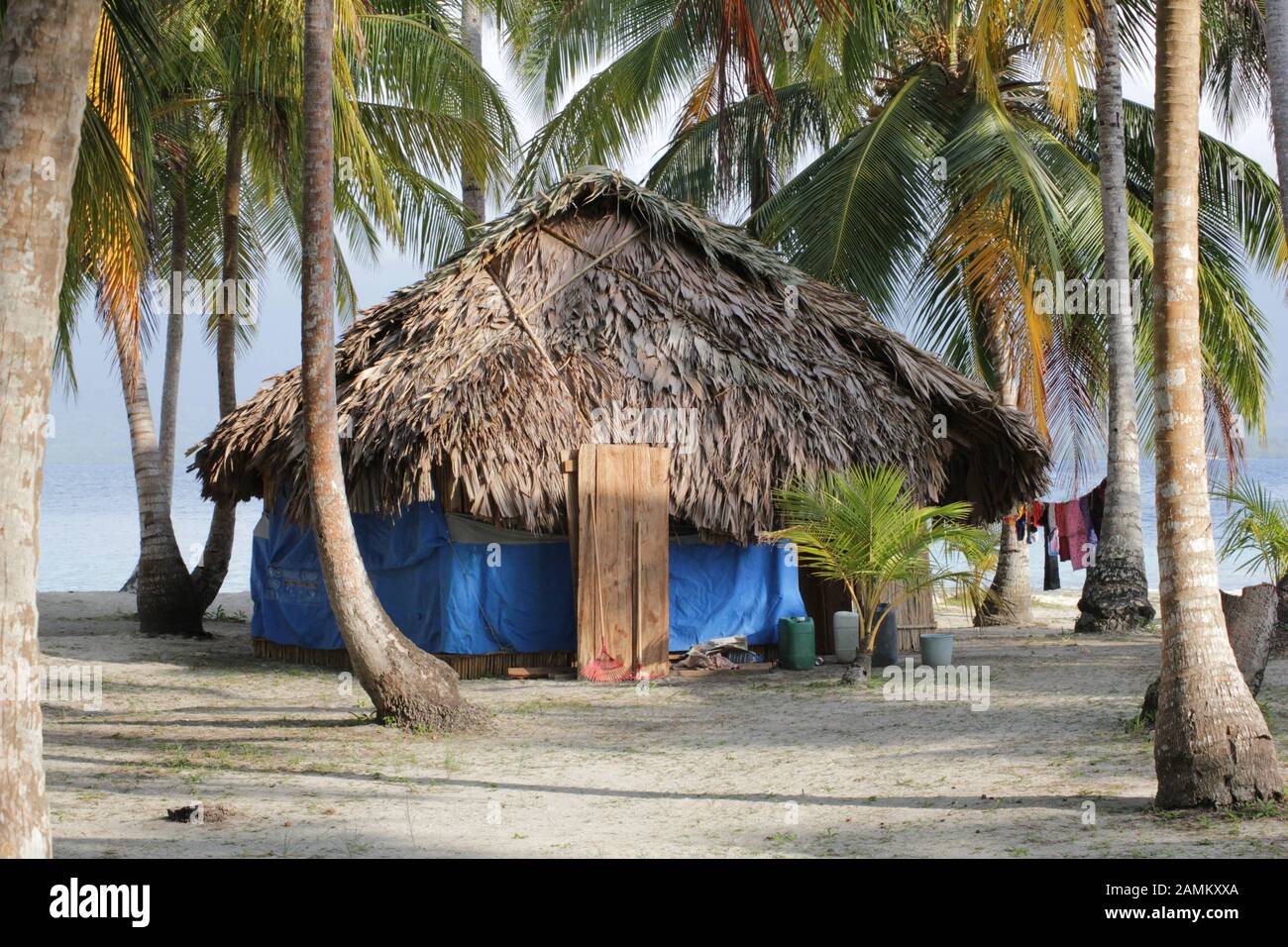 traditional hut of the Kuna Indians on the sandy beach of the San Blas