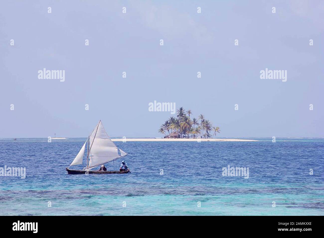 traditional fishing boat of the Kuna Indians on the sandy beach of the