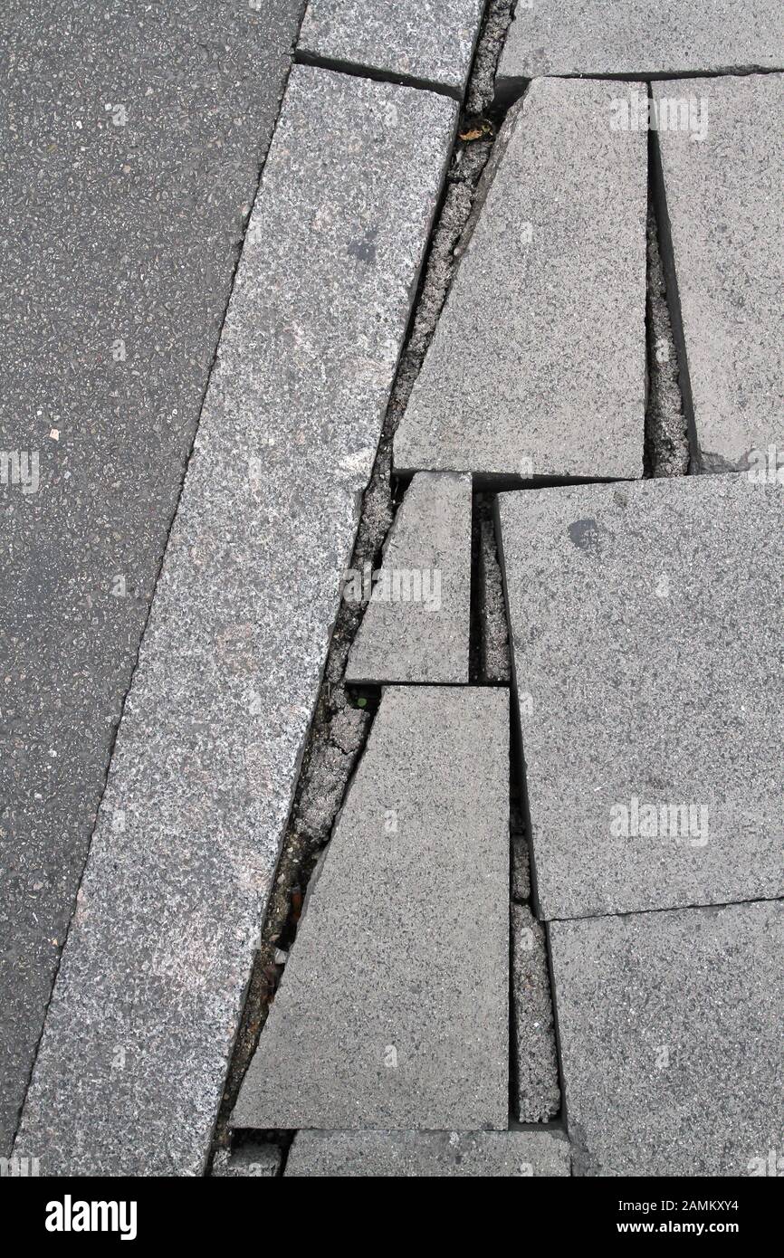 Poorly laid tiles between the valley and Viktualienmarkt. Between the stones are deep crevices. [automated translation] Stock Photo
