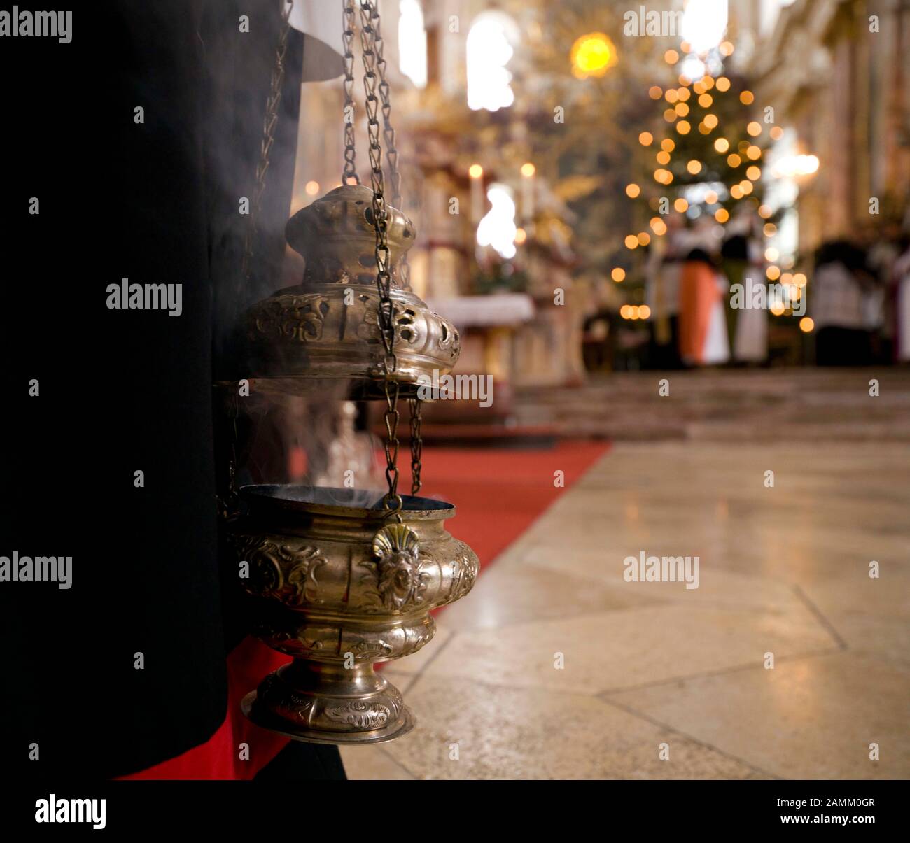 Incense burner in the monastery church of Fürstenfeld during the broadcast of the carol singers. [automated translation] Stock Photo