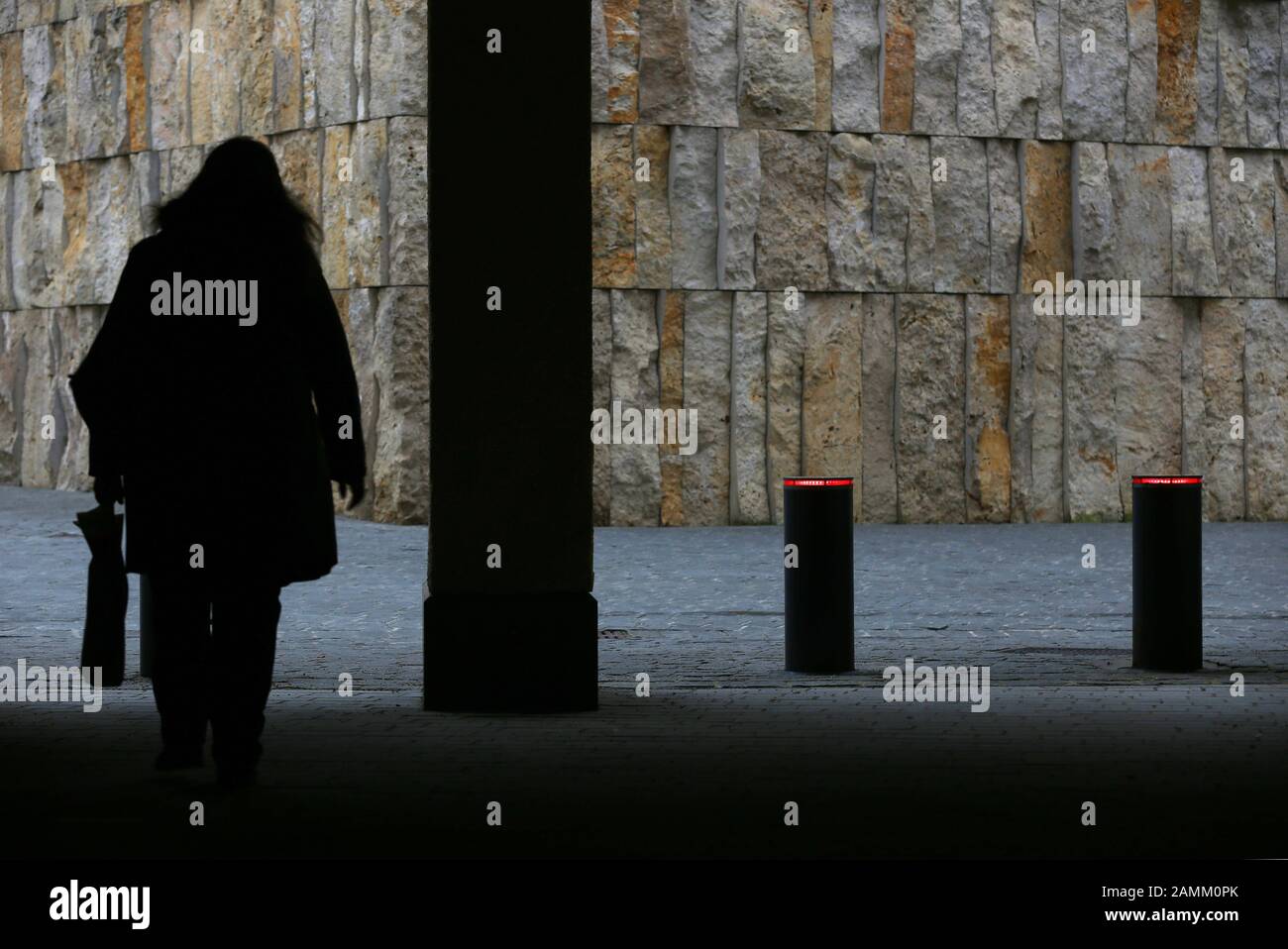 Bollards illuminated in red protect the Jewish Community Center and the