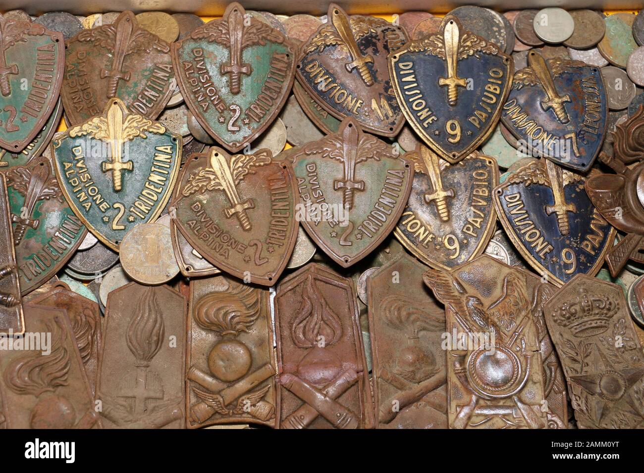 Probe operator Thomas Skroch has dug out masses of Italian military insignia and Nazi symbols from the Second World War from the moss soil around Gut Graßlfing near Olching. In the picture badges of the Divisione Pasubio and the Divisione Alpina 2 Tridentina. [automated translation] Stock Photo