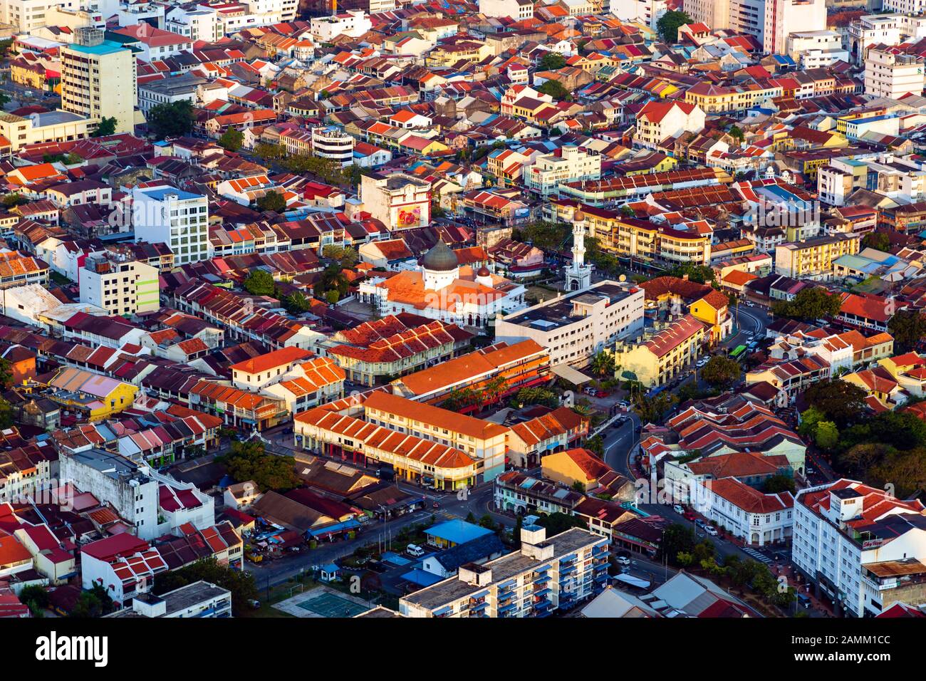 Aerial view of the city of Georgetown from the top of the Komtar Tower in Georgetown, Penang Island, Malaysia looking towards Butterworth and the Stra Stock Photo