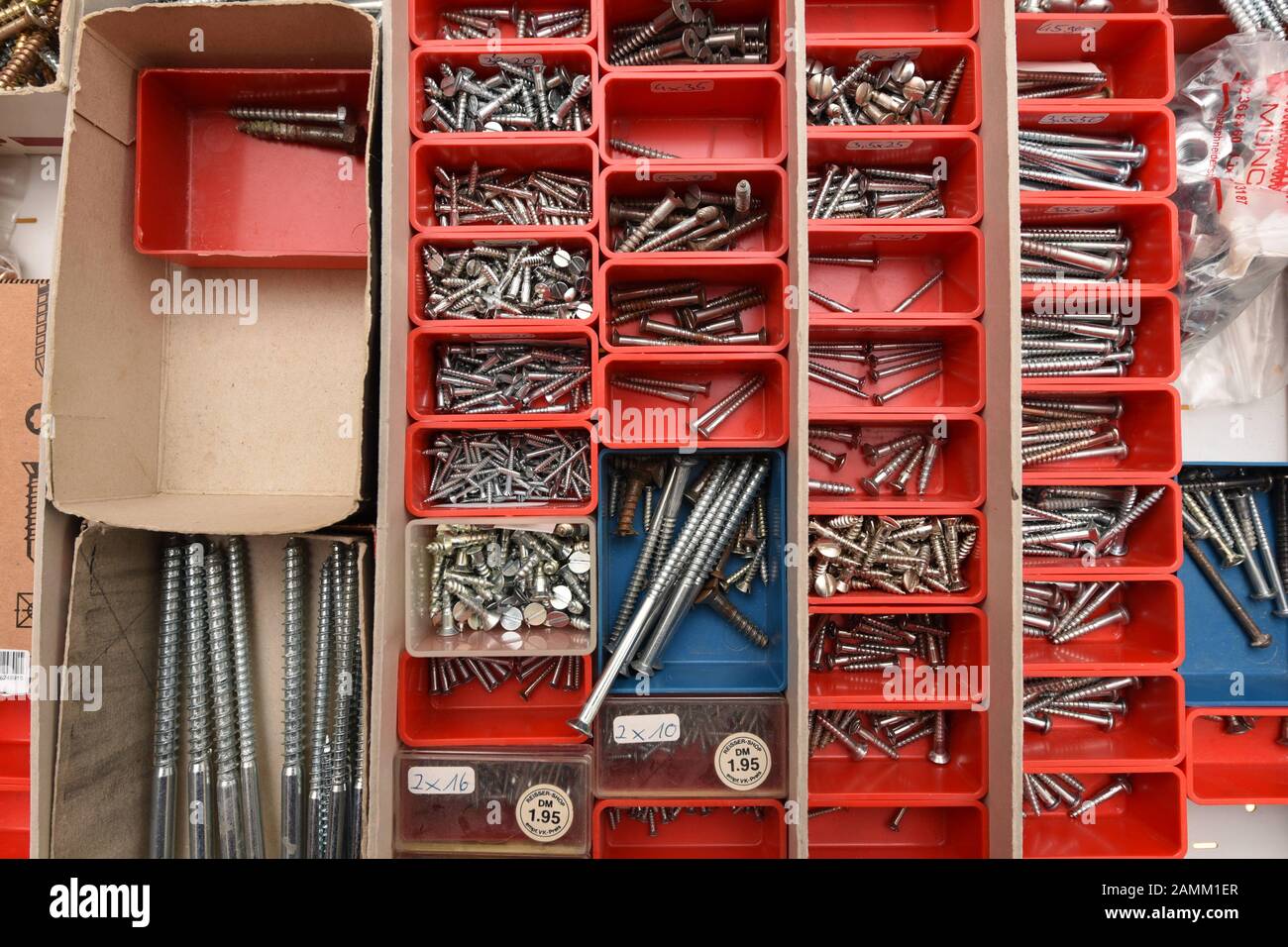 Nails and screws in a toolbox. [automated translation] Stock Photo