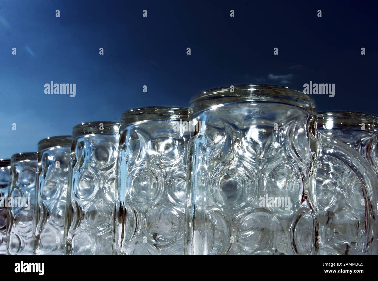 Empty beer mugs are lined up. [automated translation] Stock Photo