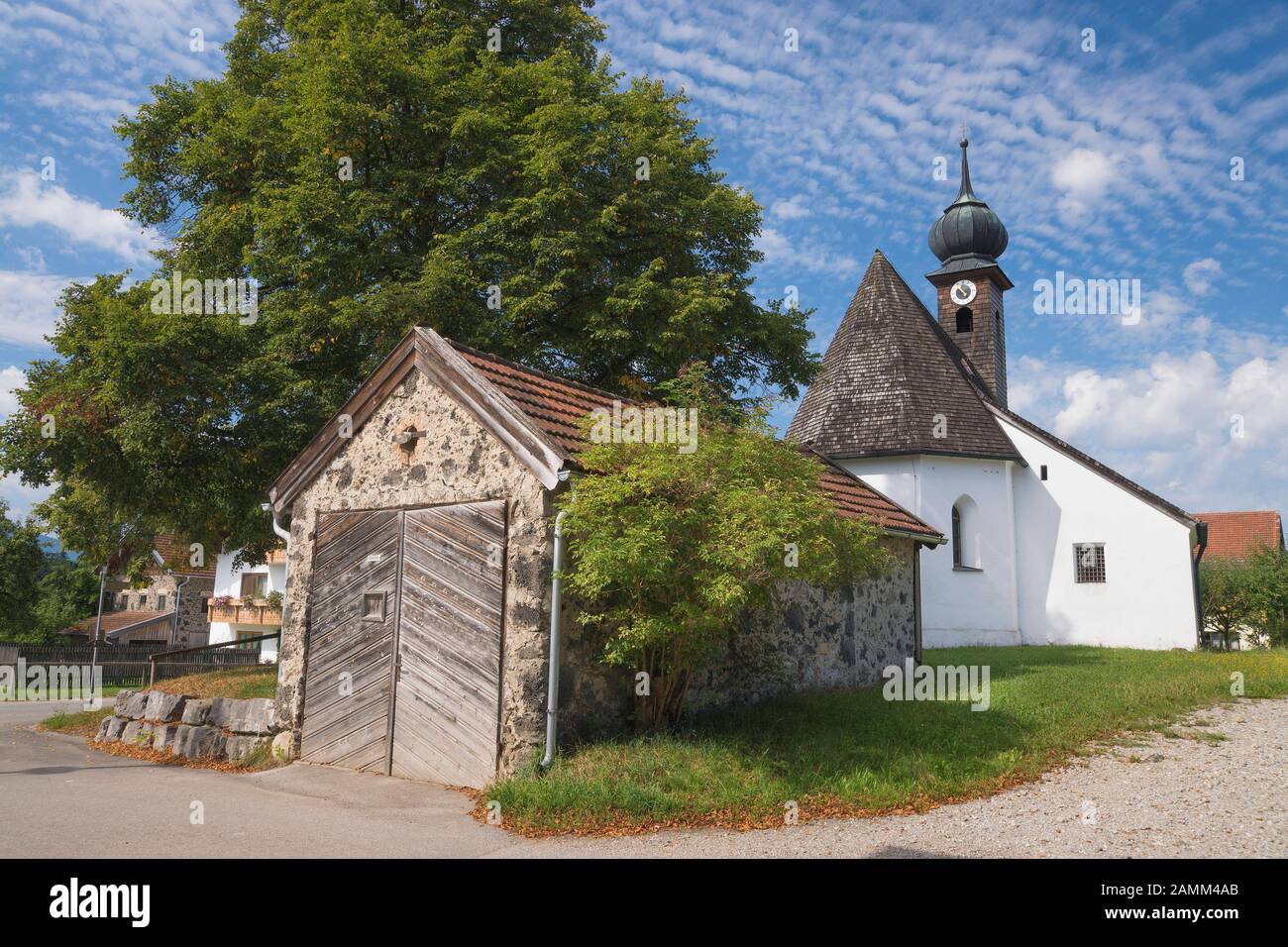 former fire station of Holzhausen with the branch church St. Leonhard in Holzhausen - Parish Teisendorf, Berchtesgadener Land, Upper Bavaria, Germany [automated translation] Stock Photo
