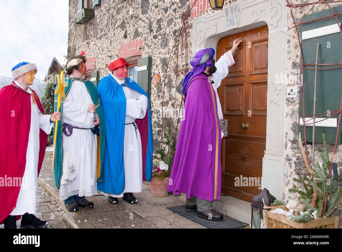 the three kings carol singers on their way through the community of