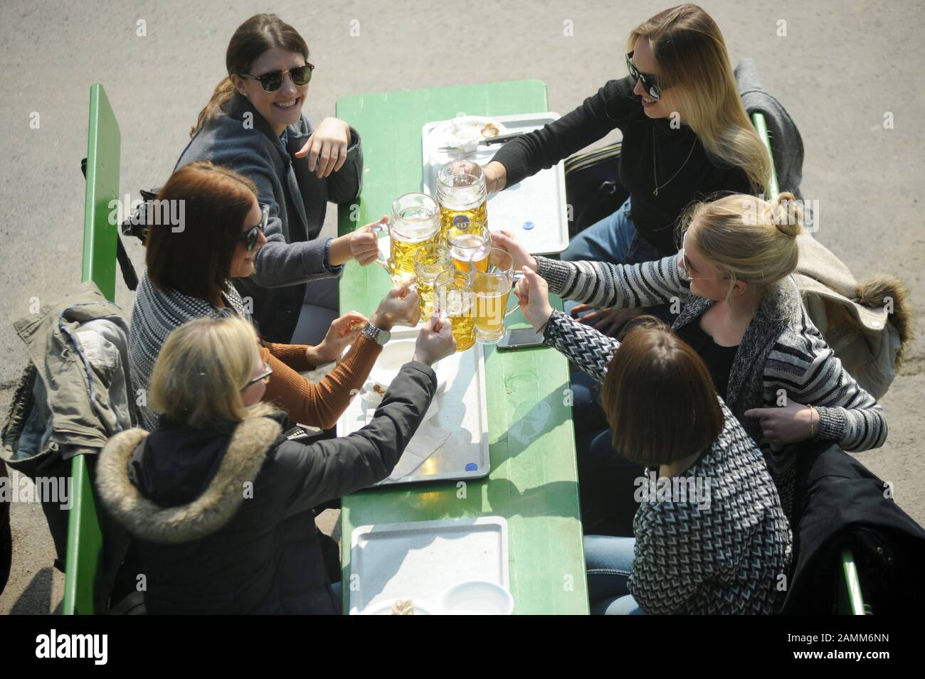 Visitors in spring in the beer garden at the Chinese Tower in the