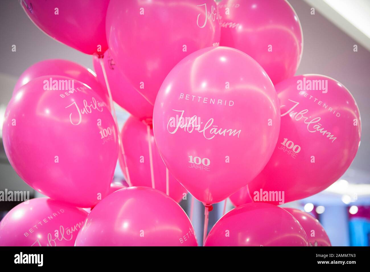 Pink balloons for the 100th anniversary of the traditional Munich company  Bettenrid. [automated translation] Stock Photo - Alamy