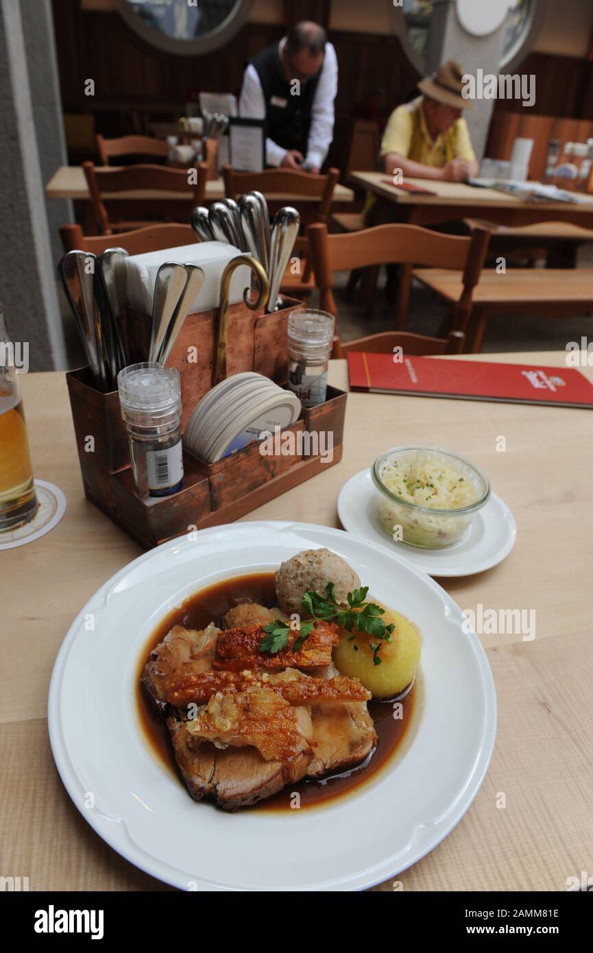 Roast pork in the traditional Bavarian restaurant "Donisl" at