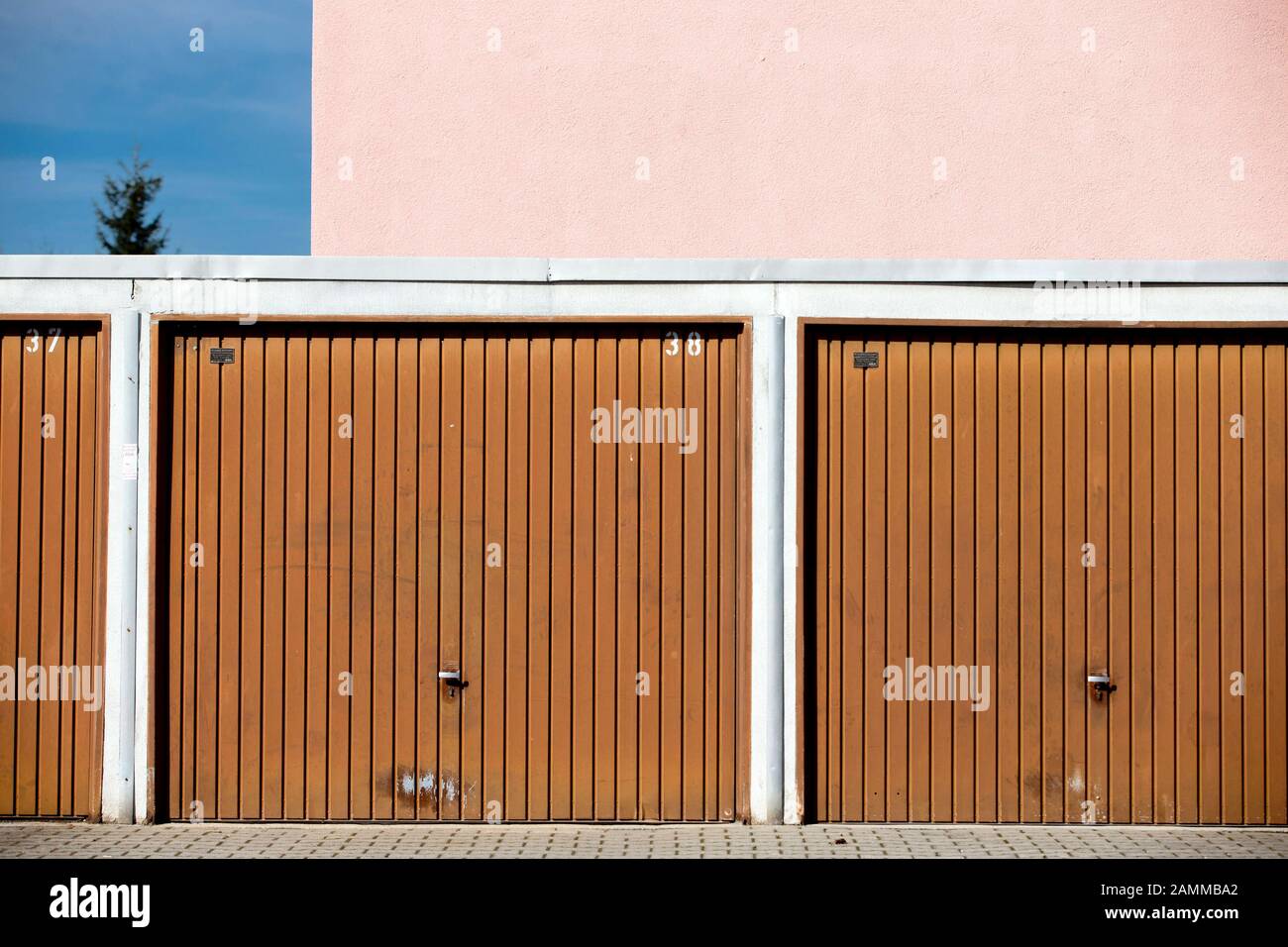 Row of garages of a terraced house settlement at the Max-Reger-Strasse in Olching. [automated translation] Stock Photo