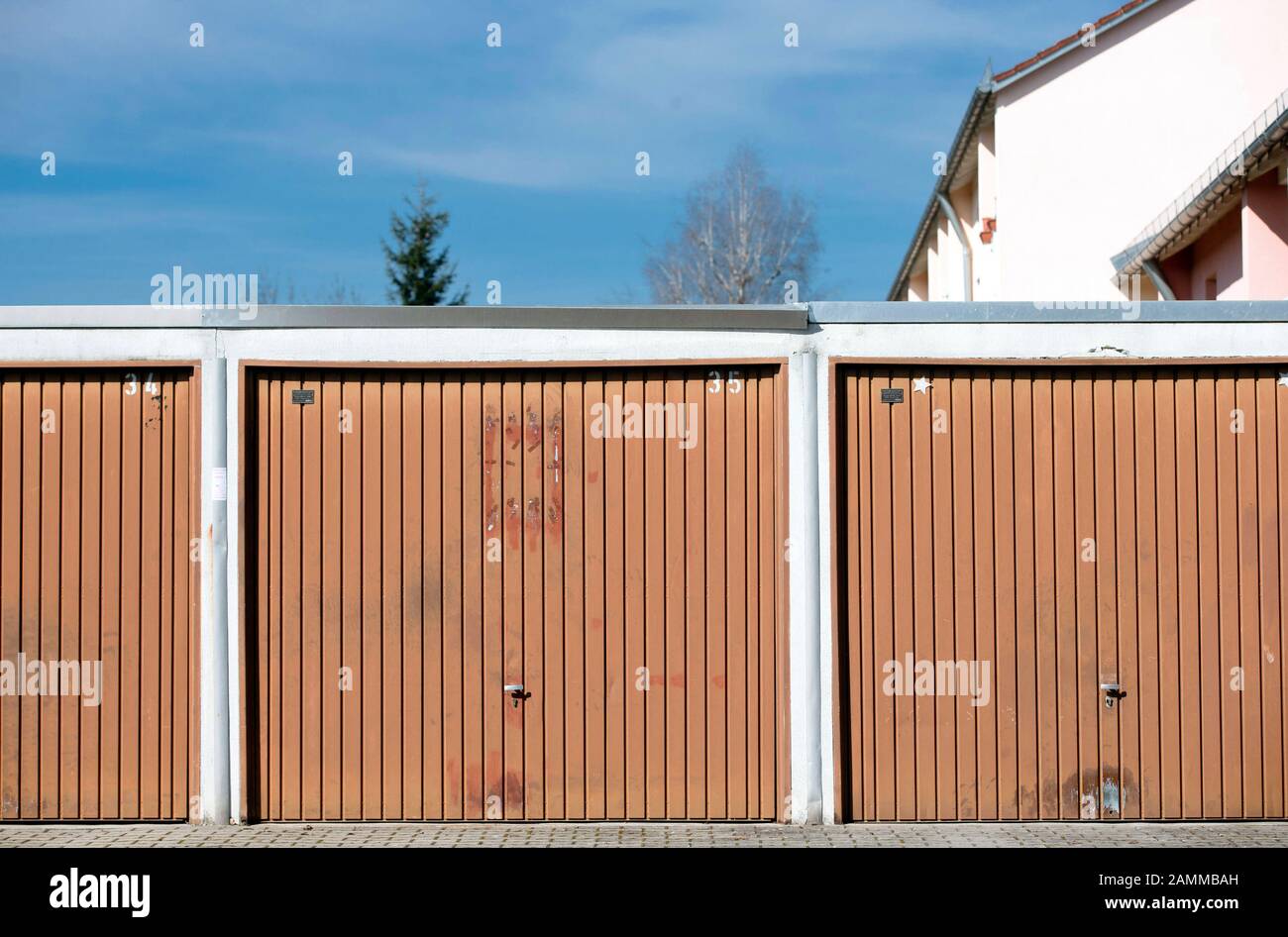 Row of garages of a terraced house settlement at the Max-Reger-Strasse in Olching. [automated translation] Stock Photo