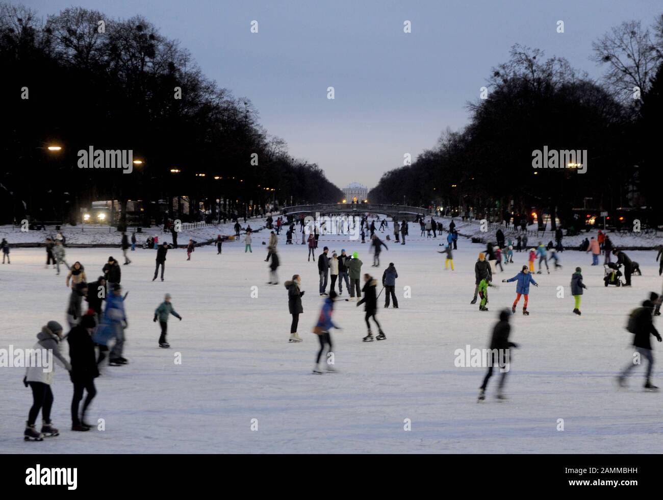 People skating on the frozen Nymphenburg Castle Canal. [automated translation] Stock Photo