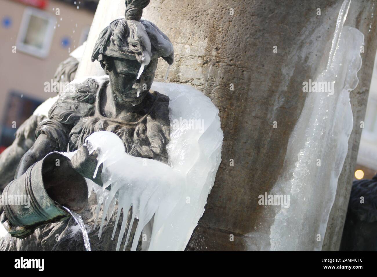 Iced figures at the Fischbrunnen on Munich's Marienplatz. [automated translation] Stock Photo