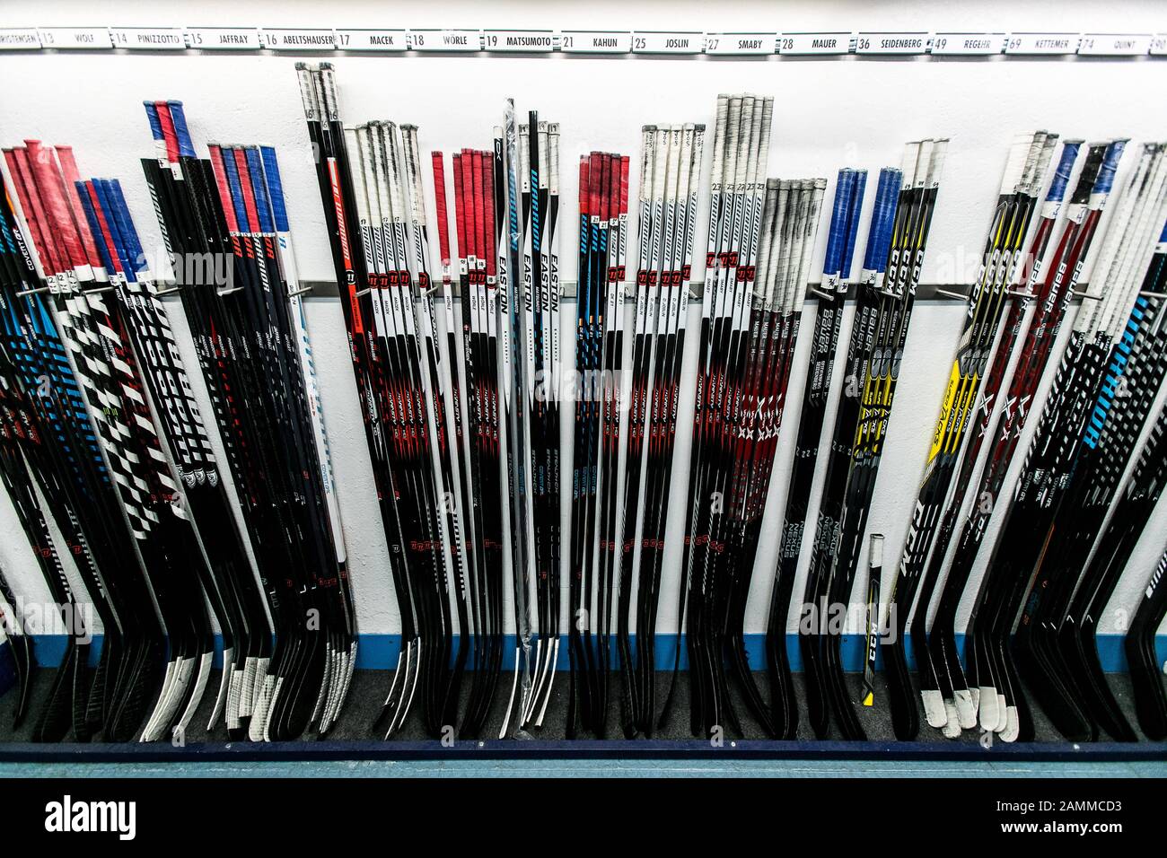 Ice hockey sticks in the changing room of the EHC Red Bull Munich in