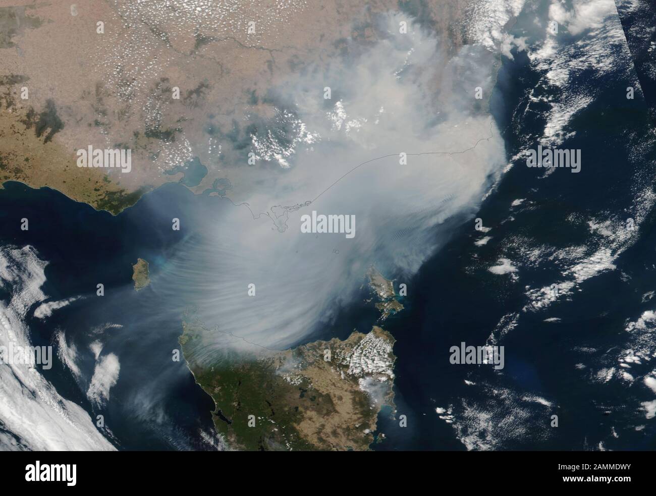 AUSTRALIA - 13 Jan 2020 - This dramatic satellite image shows the widespread bushfires raging through the states of New South Wales and Victoria in so Stock Photo