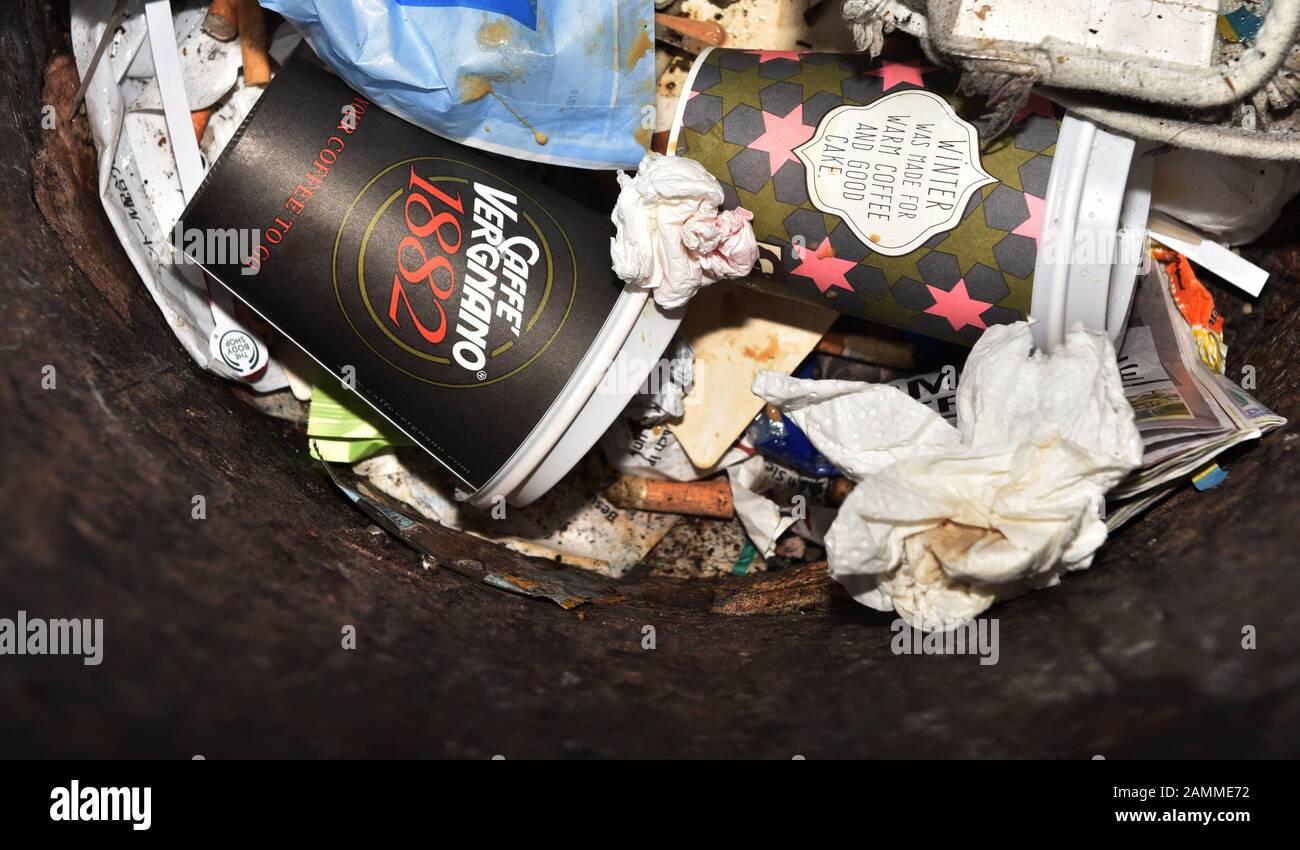 Litter bin with disposed "Coffee to go" disposable cups at Munich's