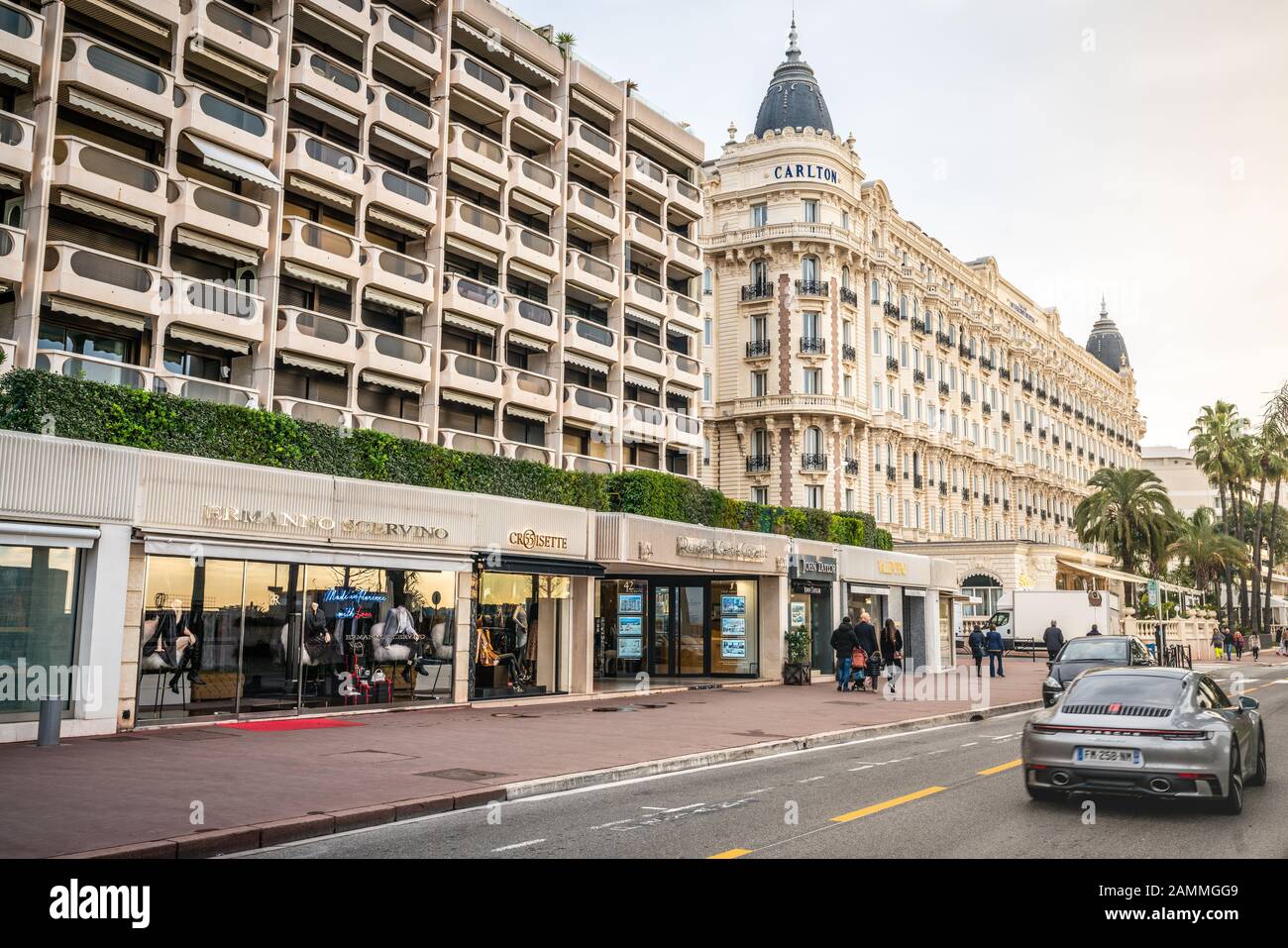 Cannes France, 29 December 2019 : Boulevard de la Croisette street view with luxury shops and Intercontinental Carlton hotel in Cannes France Stock Photo