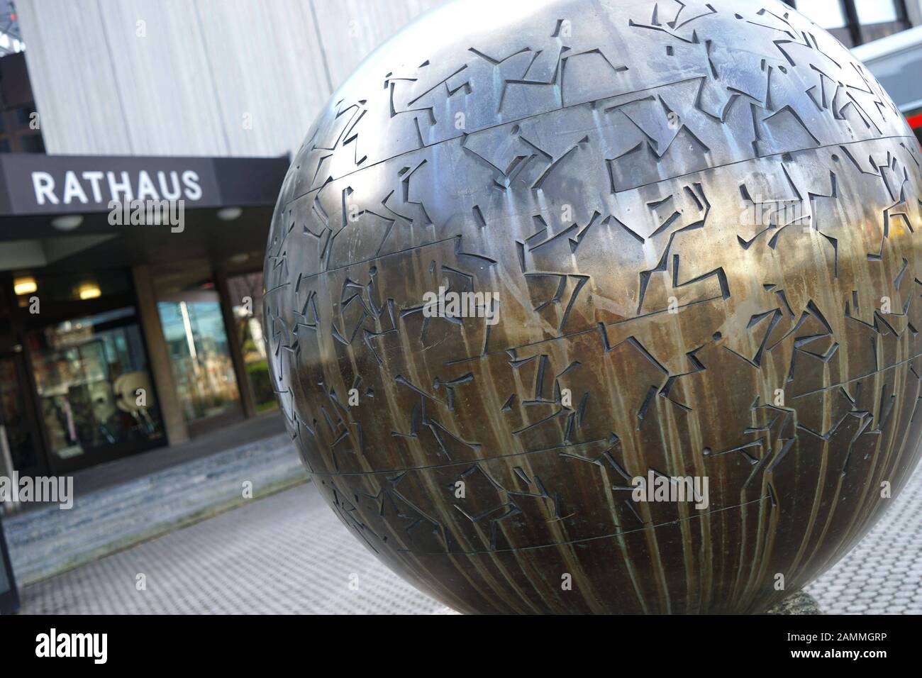 The 'Large pictographic writing sphere' by sculptor Fritz Koenig in front of the town hall in Unterföhring. [automated translation] Stock Photo