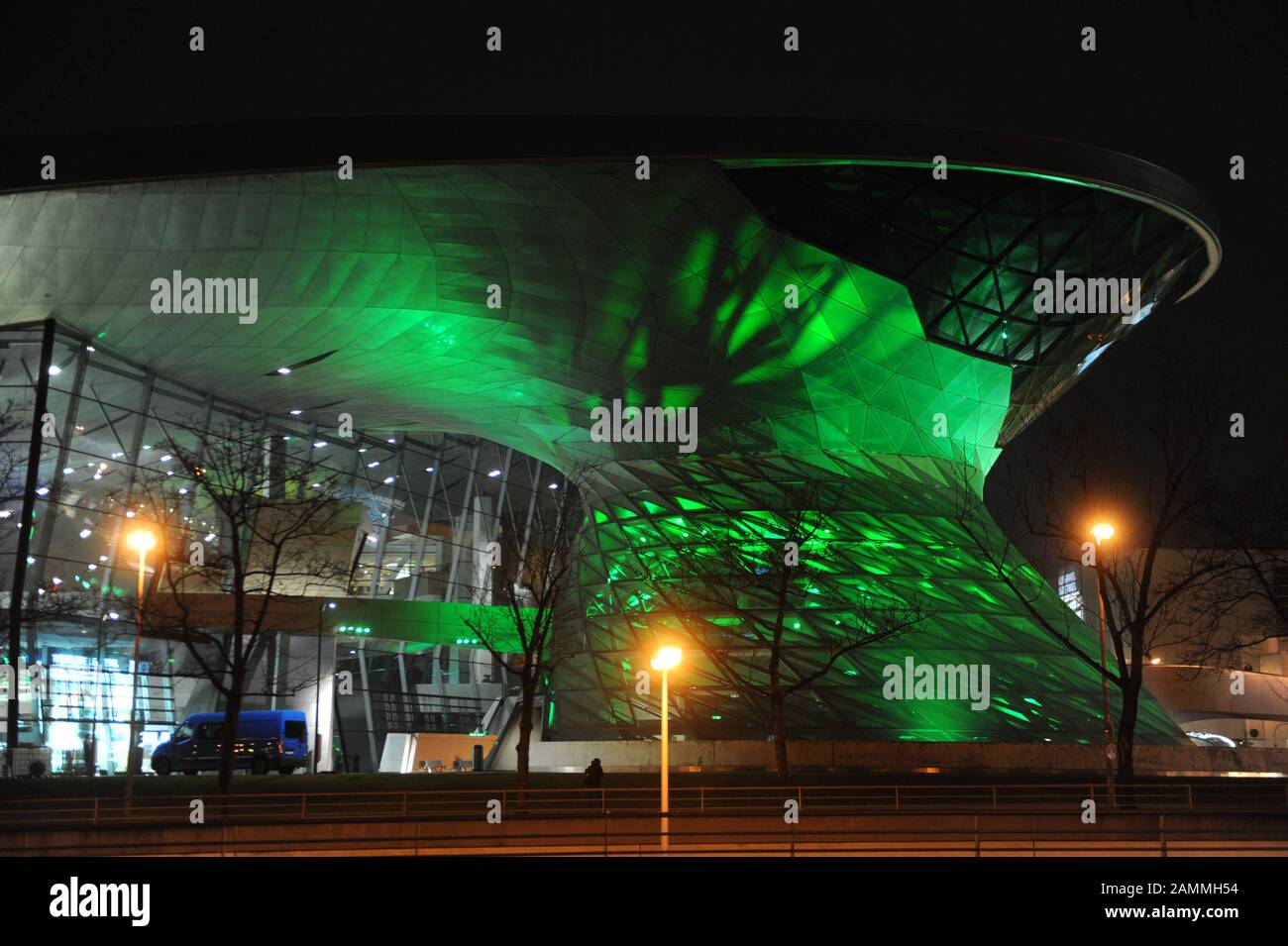 Greening Munich: the BMW World shines in the Irish national colour green on St. Patrick's Day. [automated translation] Stock Photo