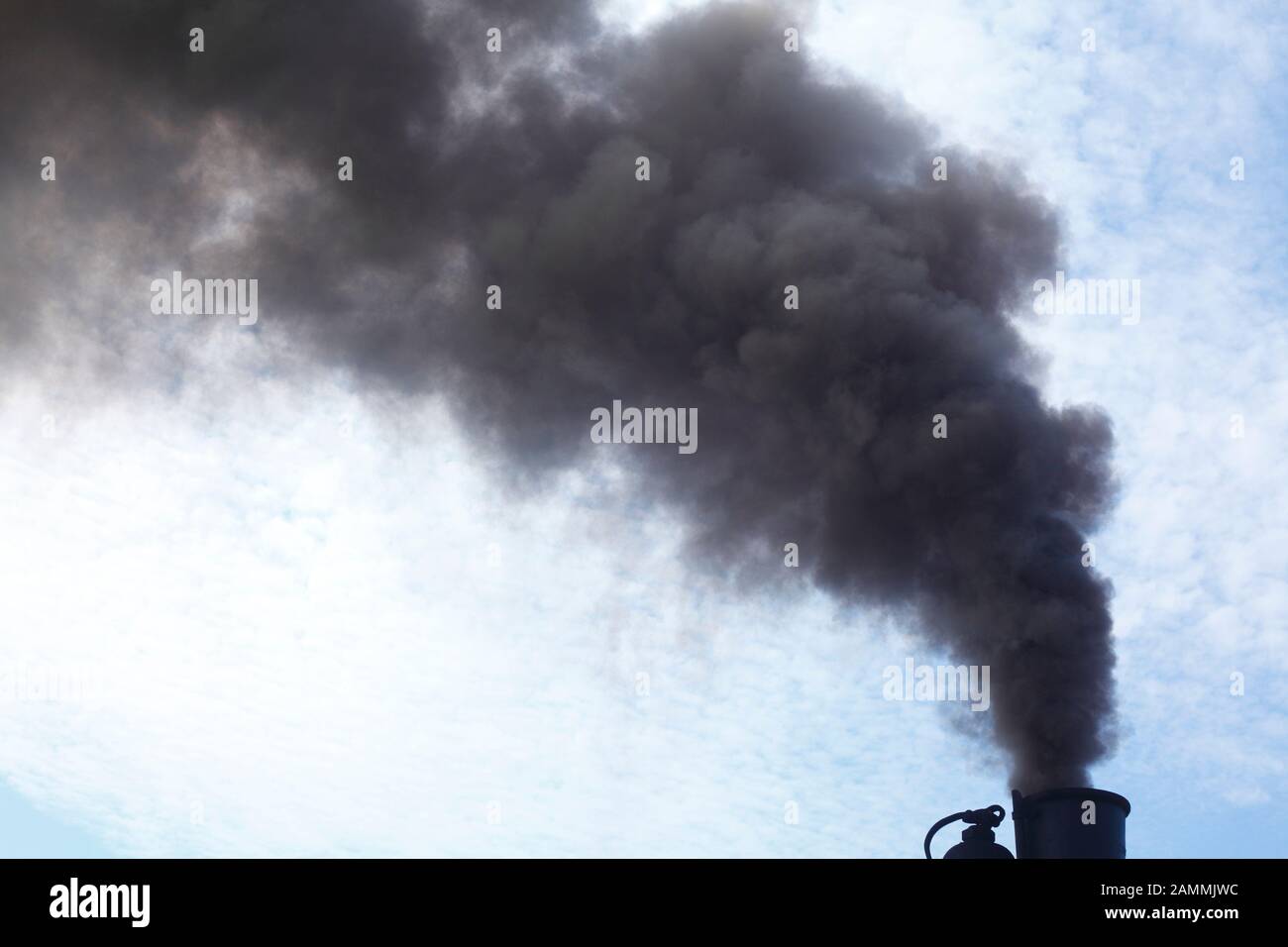 Smoking chimney of a steam locomotive of the museum railway, Bruchhausen-Vilsen, Lower Saxony, Germany Stock Photo