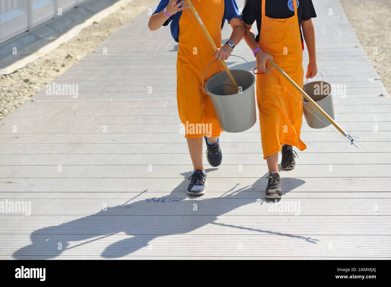 In the play city 'Mini München' in the Olympic Park, children can create their own world during the summer holidays. In the picture two children from the street cleaning. [automated translation] Stock Photo