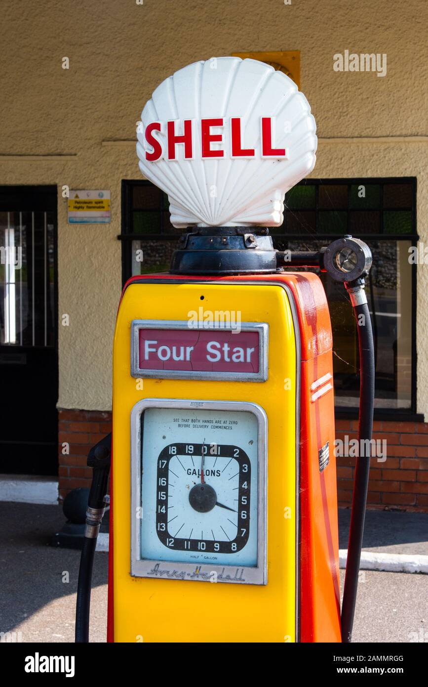 The Grade II listed Colyford Filling Station was built in 1927/28 and now features five 1950s vintage Avery Hardoll Pumps in Shell livery. Stock Photo