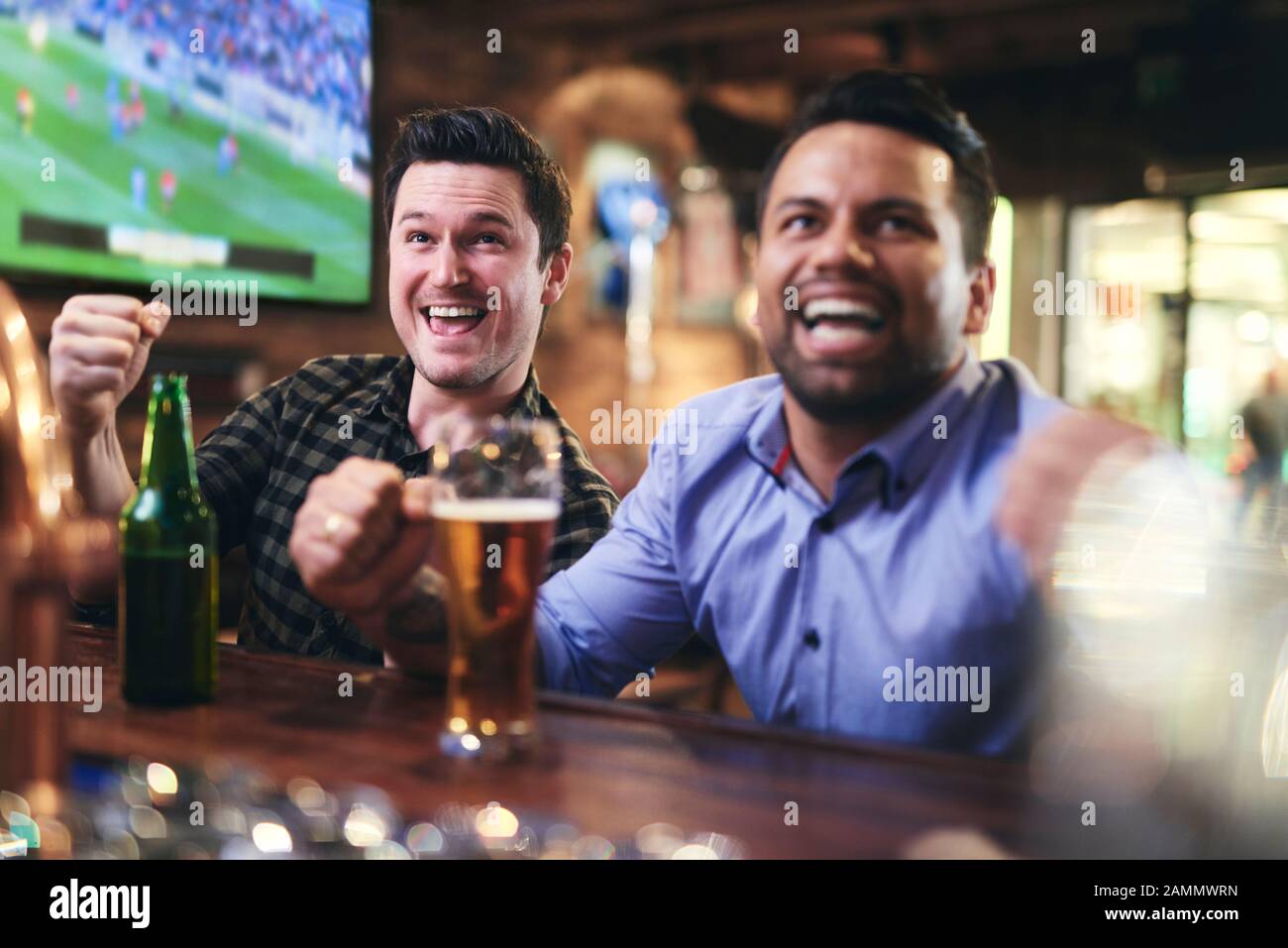 Loyal football fans supporting their team Stock Photo Alamy