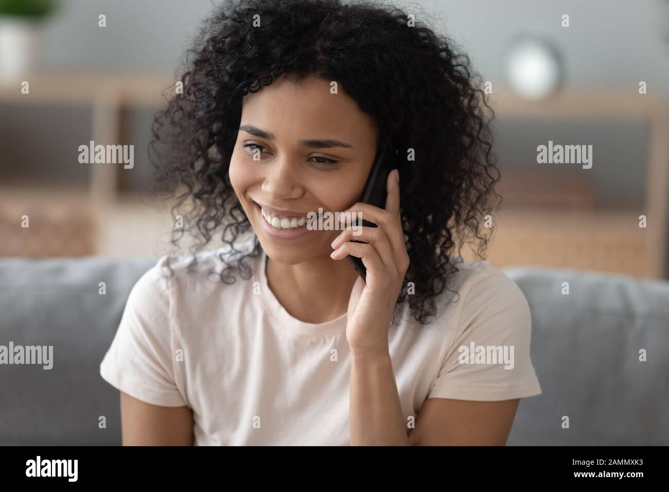 African woman smiling hi-res stock photography and images - Alamy