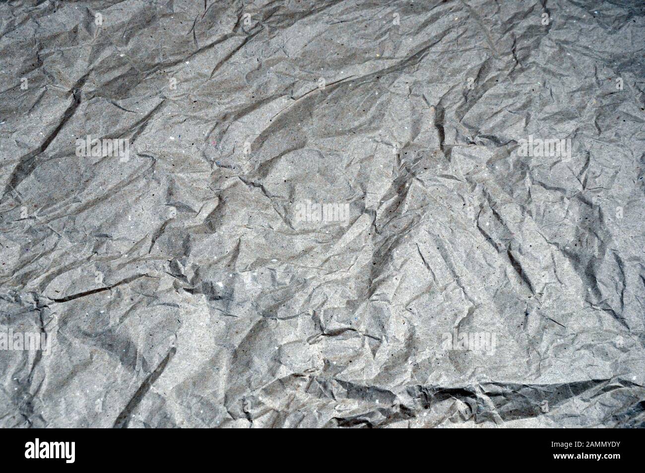 Top view beige crumpled wrapping paper. background Stock Photo