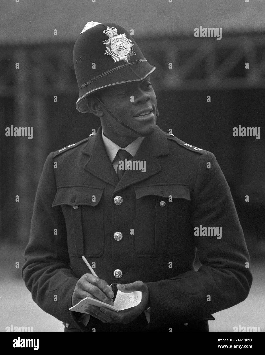Metropolitan police london uniform Black and White Stock Photos ...
