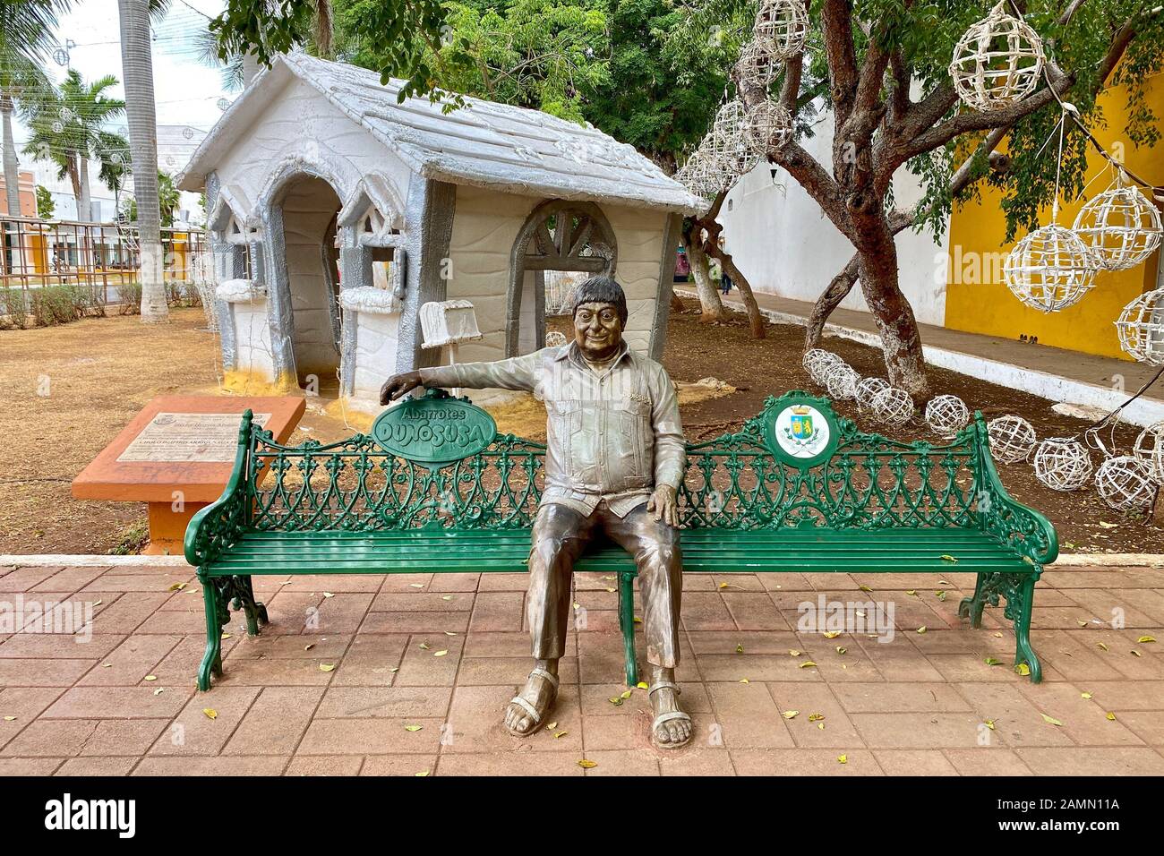 Statue of Hector Herrera on bench. Merida, Mexico. Stock Photo