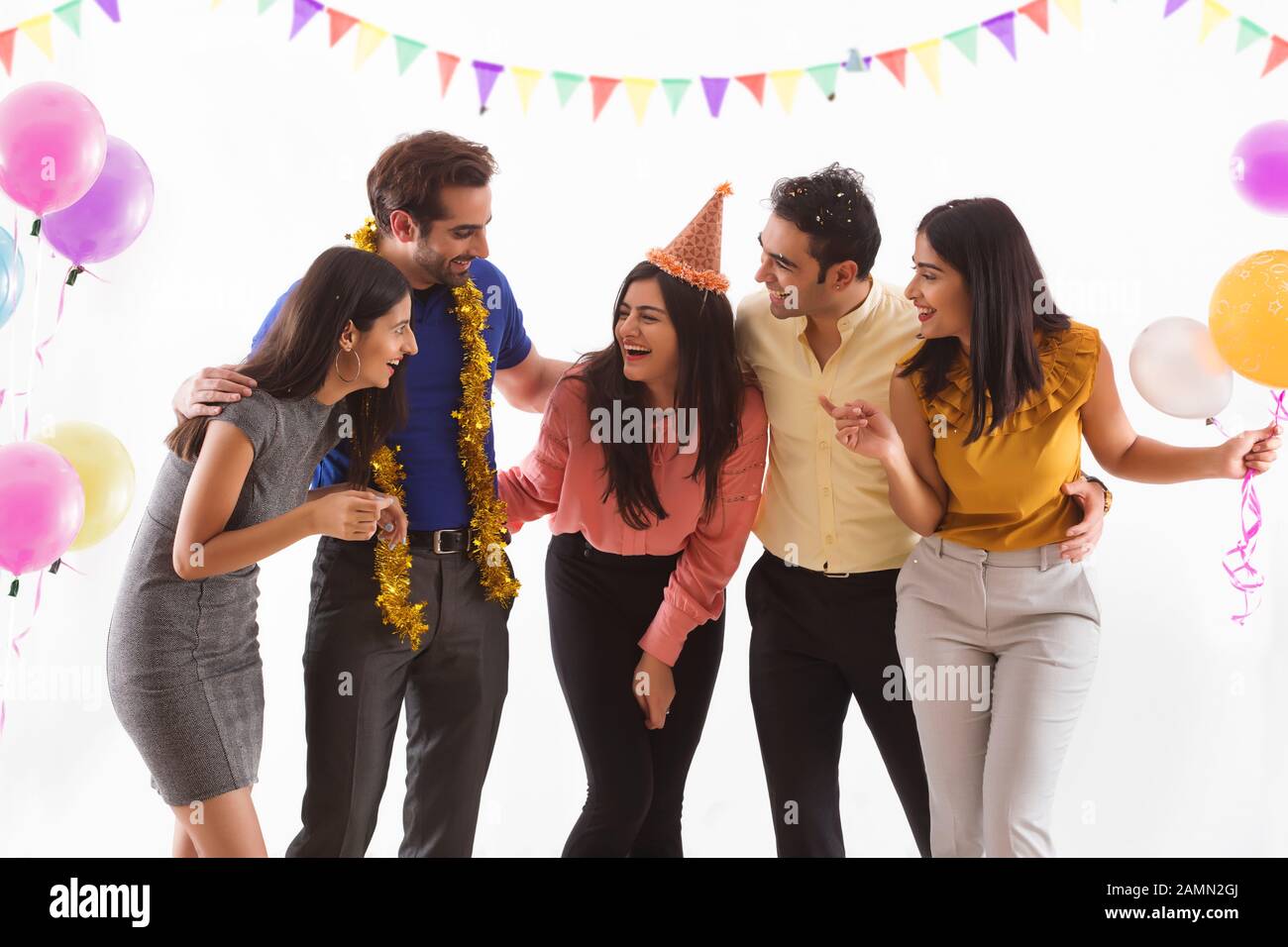 Friends having fun together at a party. Stock Photo