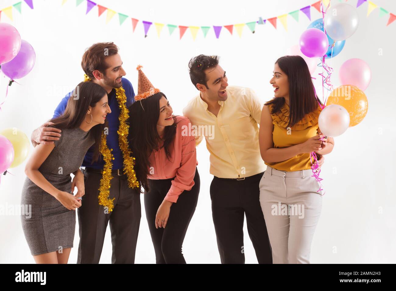 Friends having fun together at a party. Stock Photo